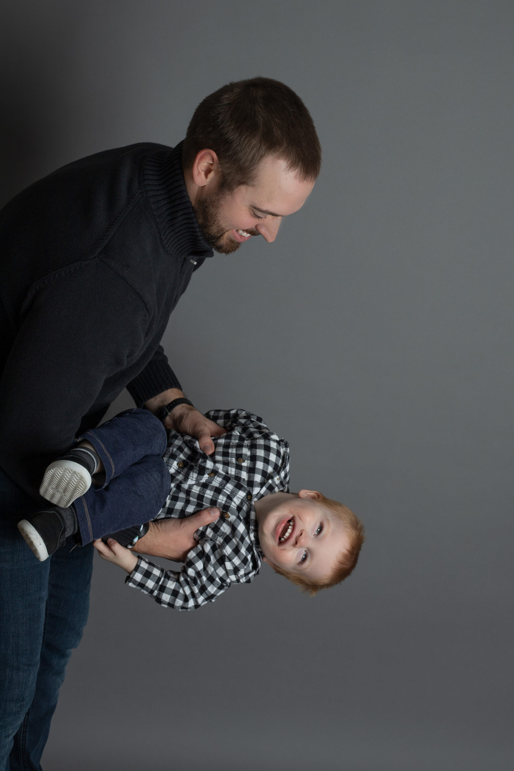 Dad and son playing | Coralville Family Photos | Coralville Family Photographer