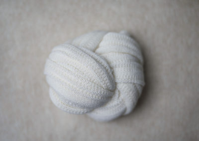 Cream posing newborn fabric Cedar Rapids Portraits