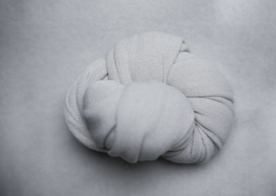 Frost baby newborn posing fabric Cedar Rapids