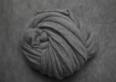 Grey Cedar Rapids newborn baby photo posing fabric