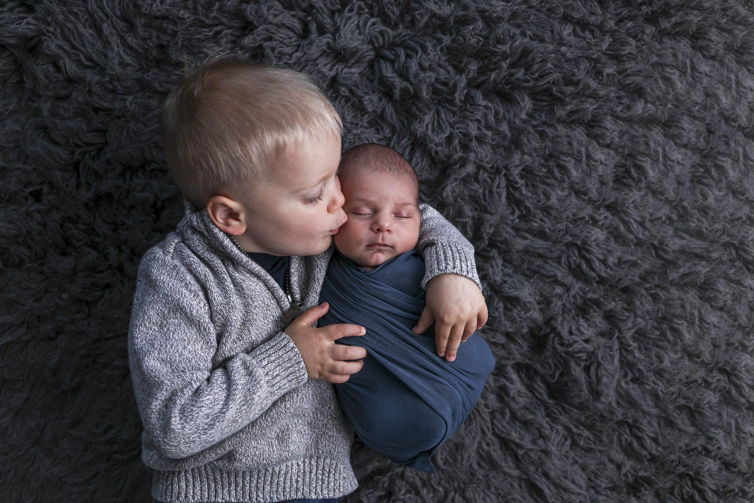 Baby and brother newborn in home photos